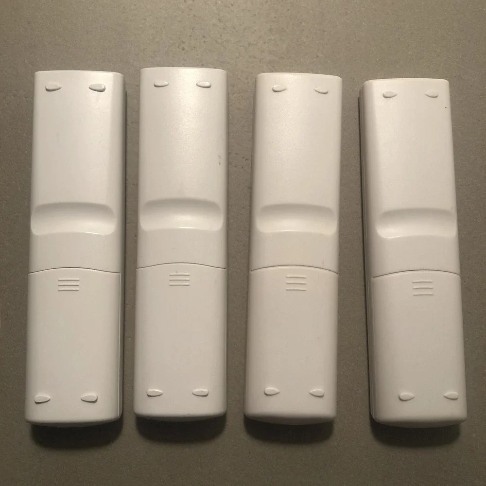 4 Unbranded CR-45Z White Remote Control - In Working Condition